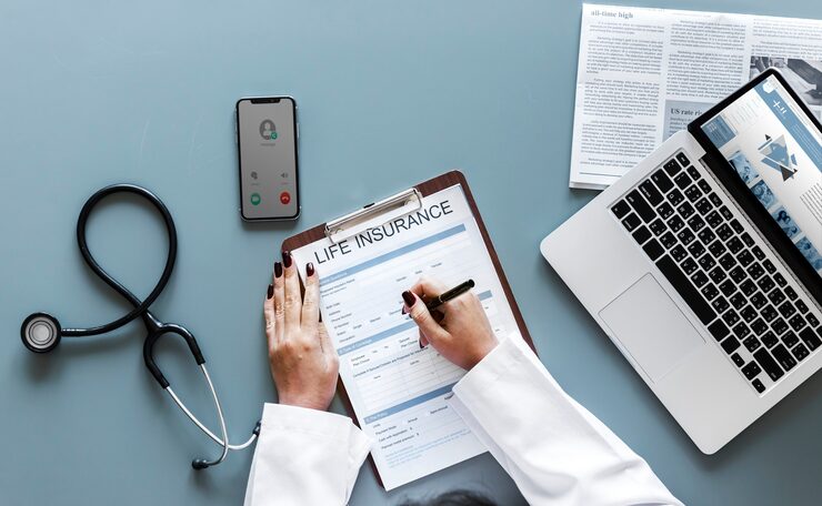 Doctor Filling Up Life Insurance Form 53876 20493